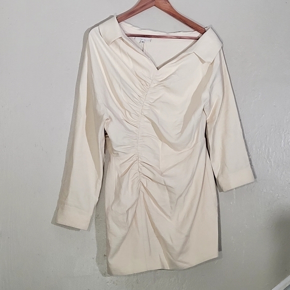 The Sei Dresses & Skirts - The SEI Dress Assymestrical Button- Down